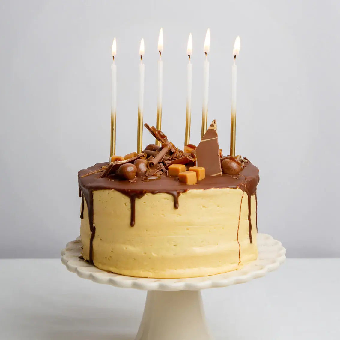 gold ombre verjaardagskaarsen sweet 16 kaarsen meisje sfeerfoto kaarsen op taart